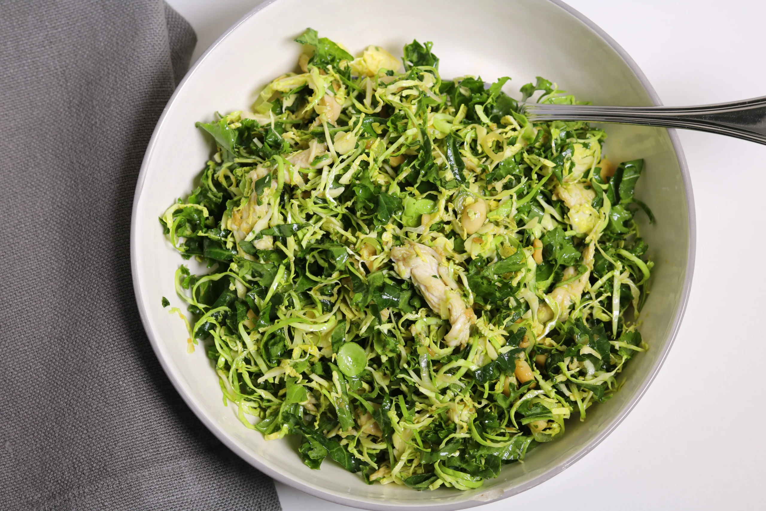 Asian Kale Shaved Brussels Sprout Salad with Ginger Miso Dressing