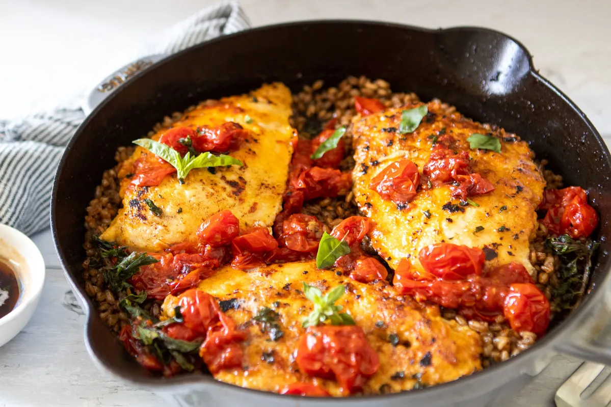 Chicken Thighs with Farro and Burst Tomatoes
