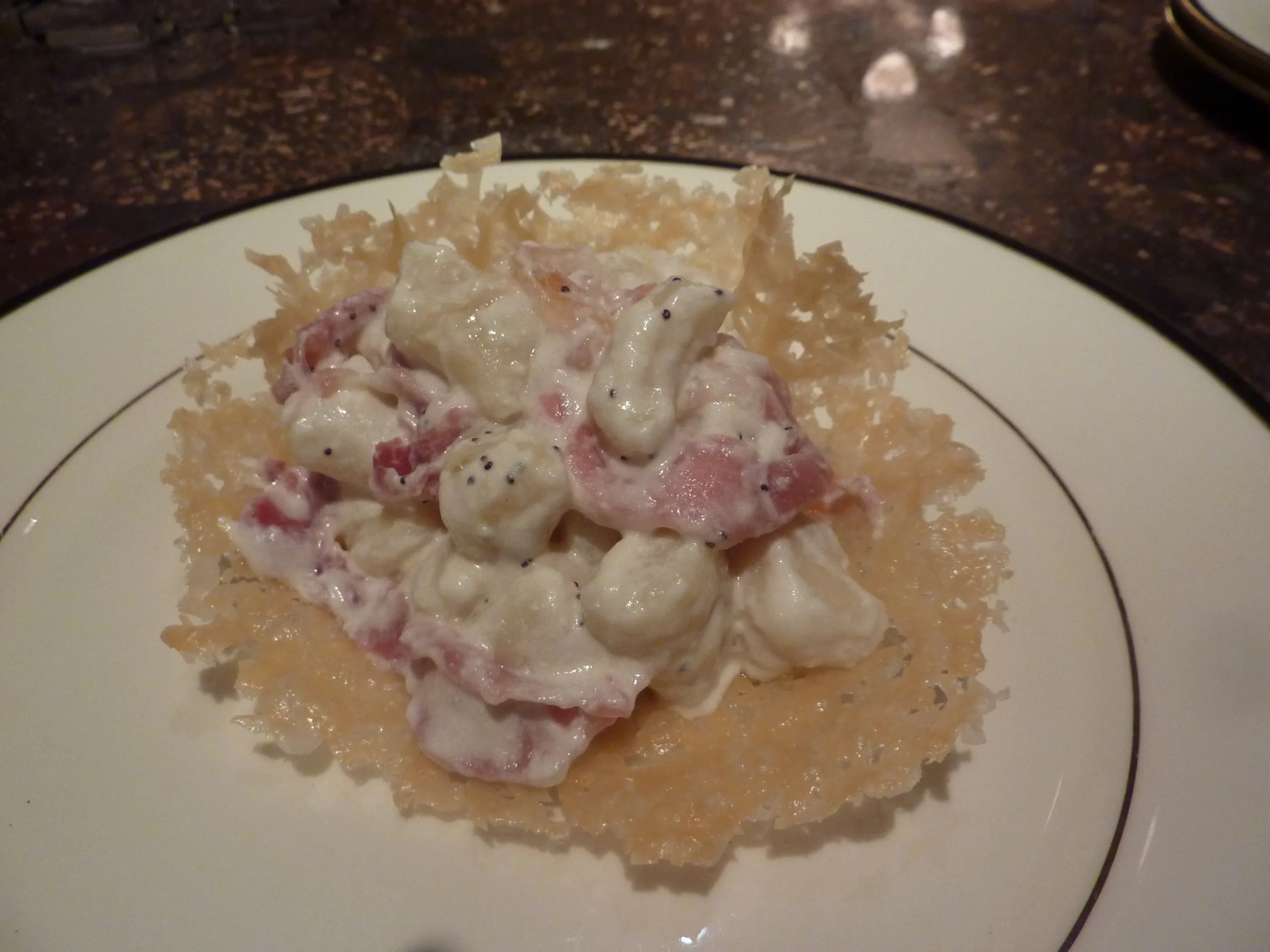 Gnocchi con Crema di Montasio e Semi di Papavero e Speck