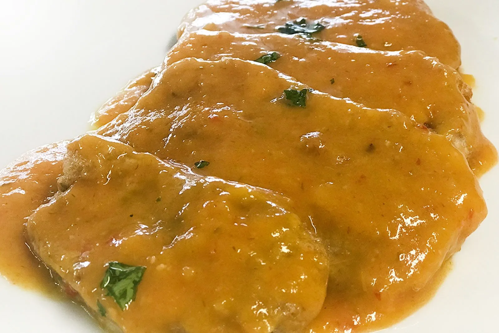 Lengua en Salsa Criolla