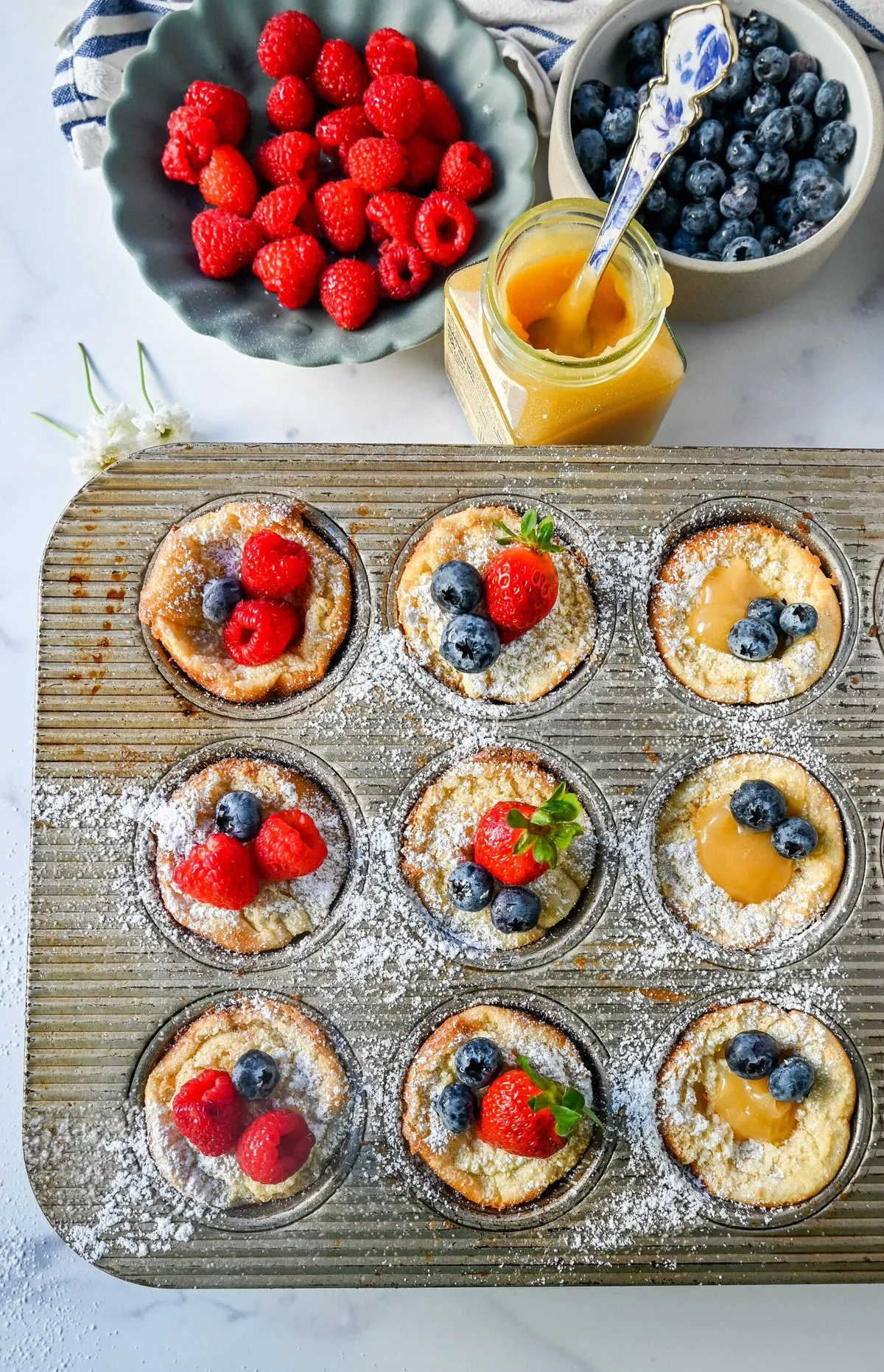 Mini Dutch Baby Pancakes in a Muffin Tin
