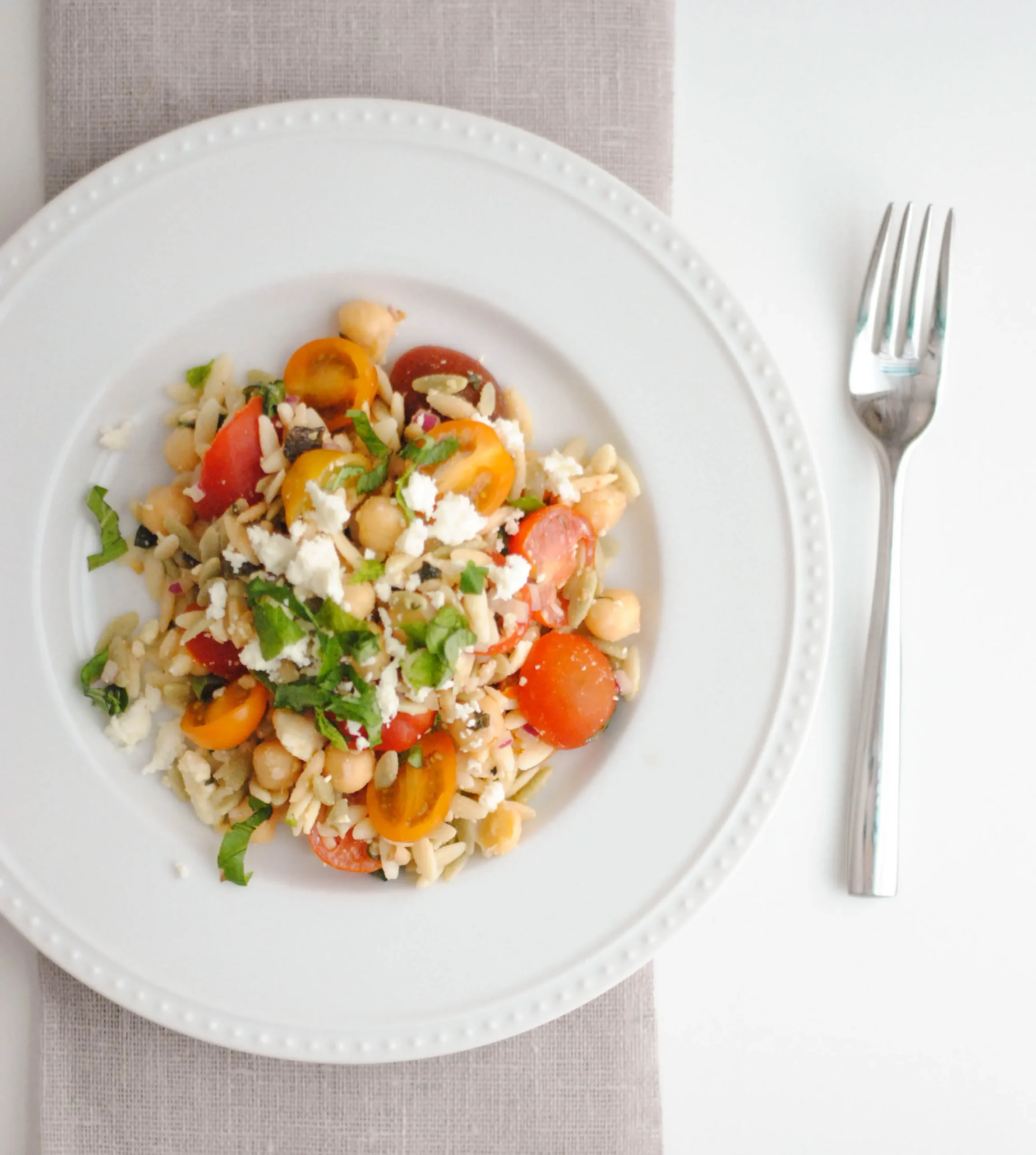 Orzo Salad with Artichokes, Tomatoes, Chickpeas, Feta, and Lemon Basil Dressing