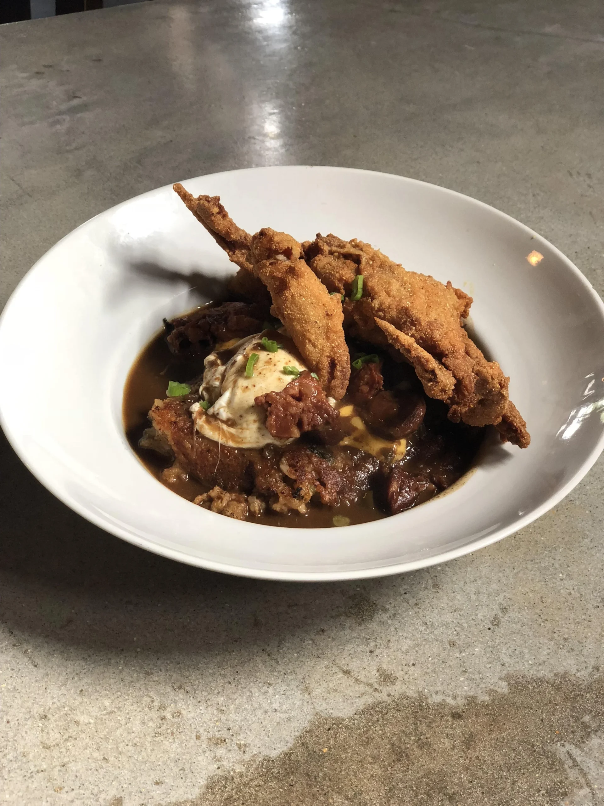 Poached Eggs over Chicken Andouille Cakes