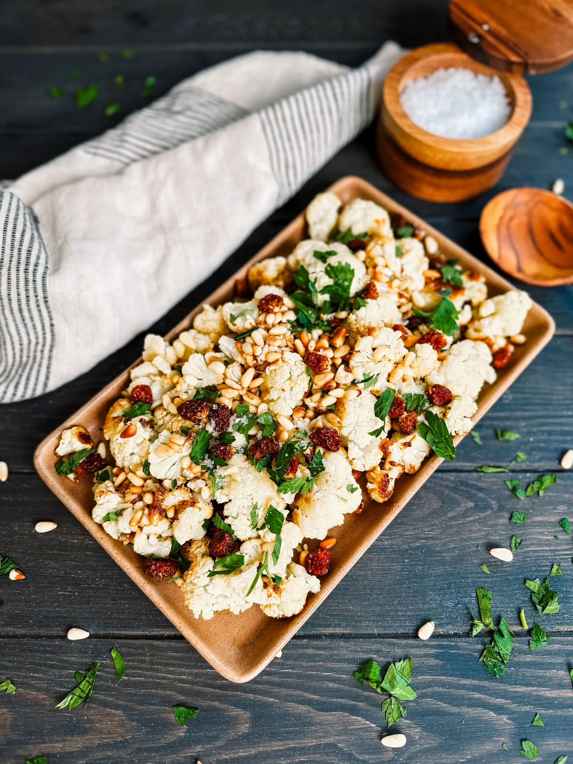 Roasted Cauliflower Steaks with Golden Raisins and Pine Nuts