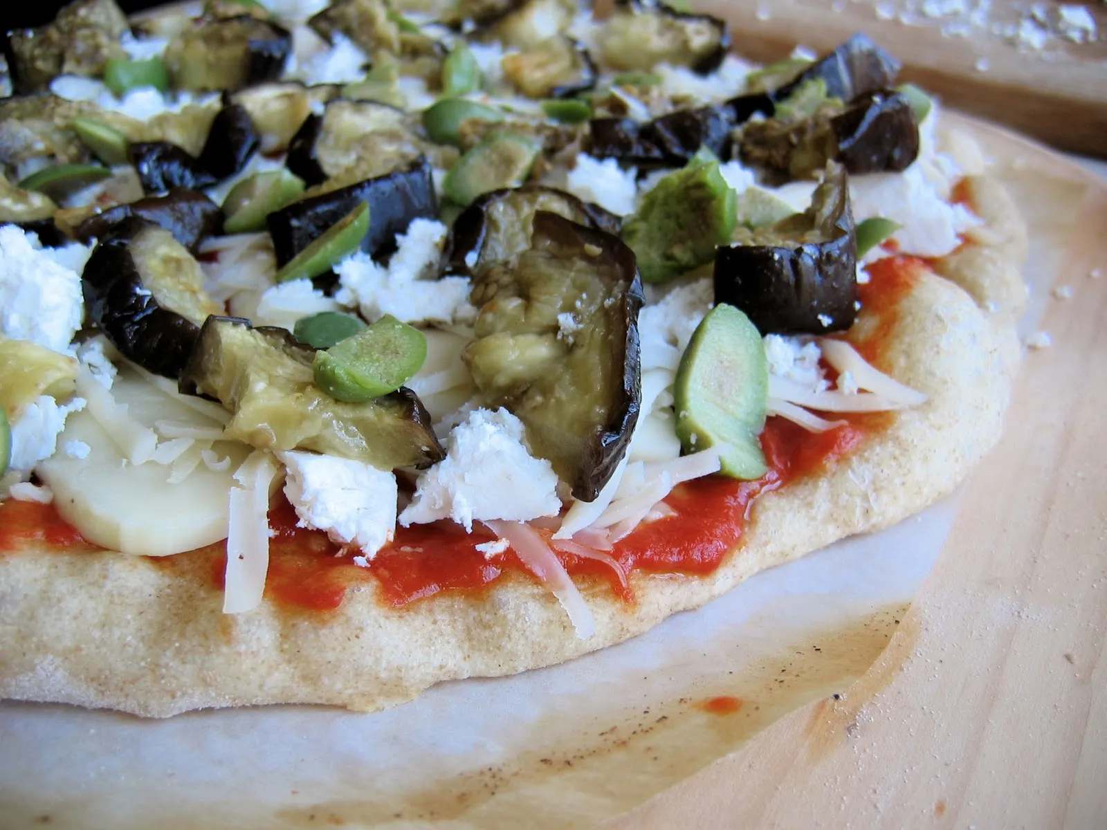 Roasted Eggplant Pizza with Almond Ricotta and Chili Oil