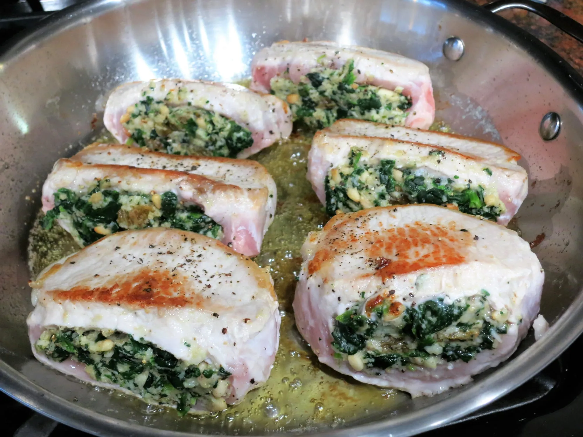 Sicilian Stuffed Pork Chops with White Wine and Caper Sauce