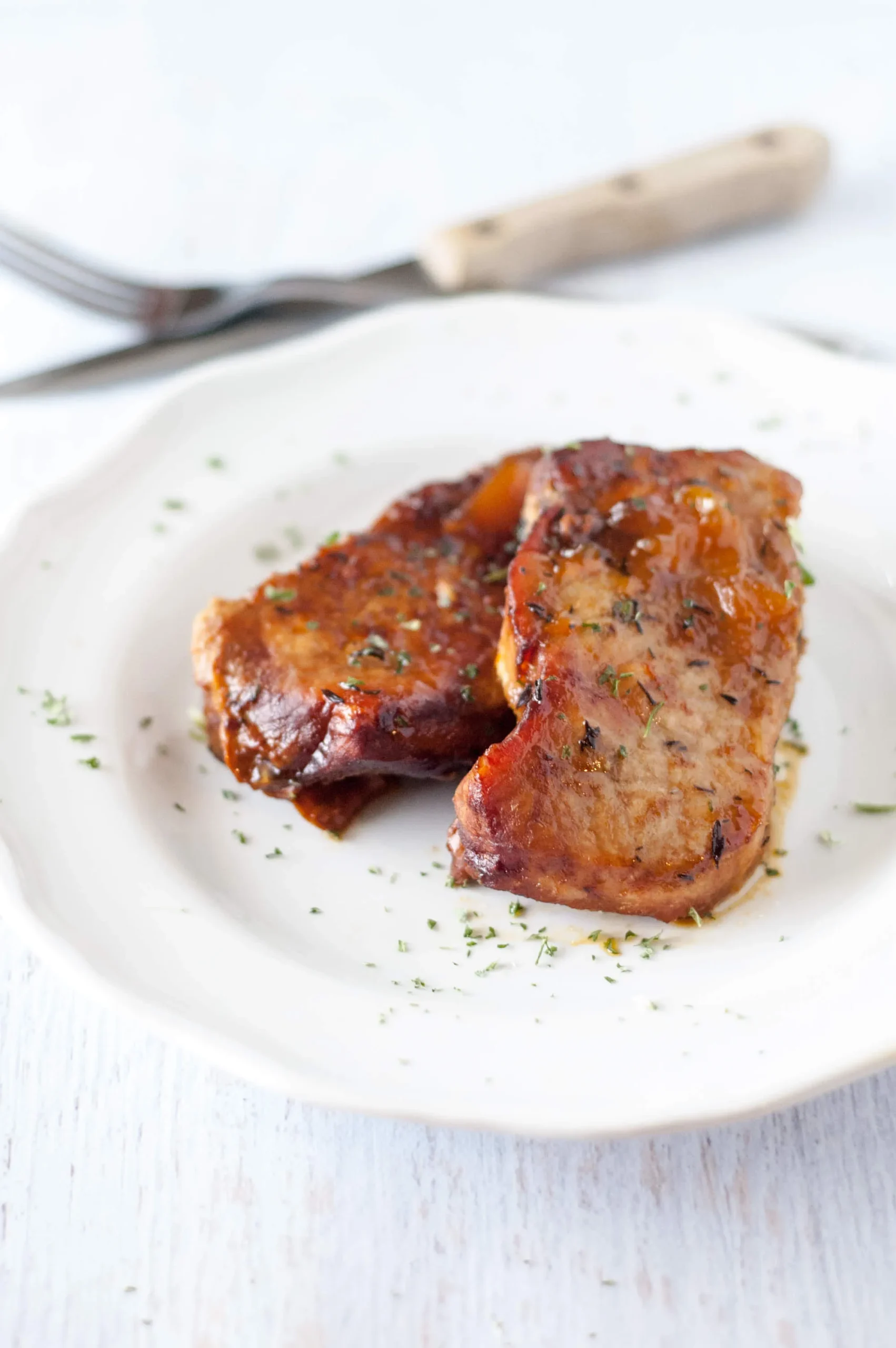 Slow Cooker Spicy Peach Glazed Pork Chops