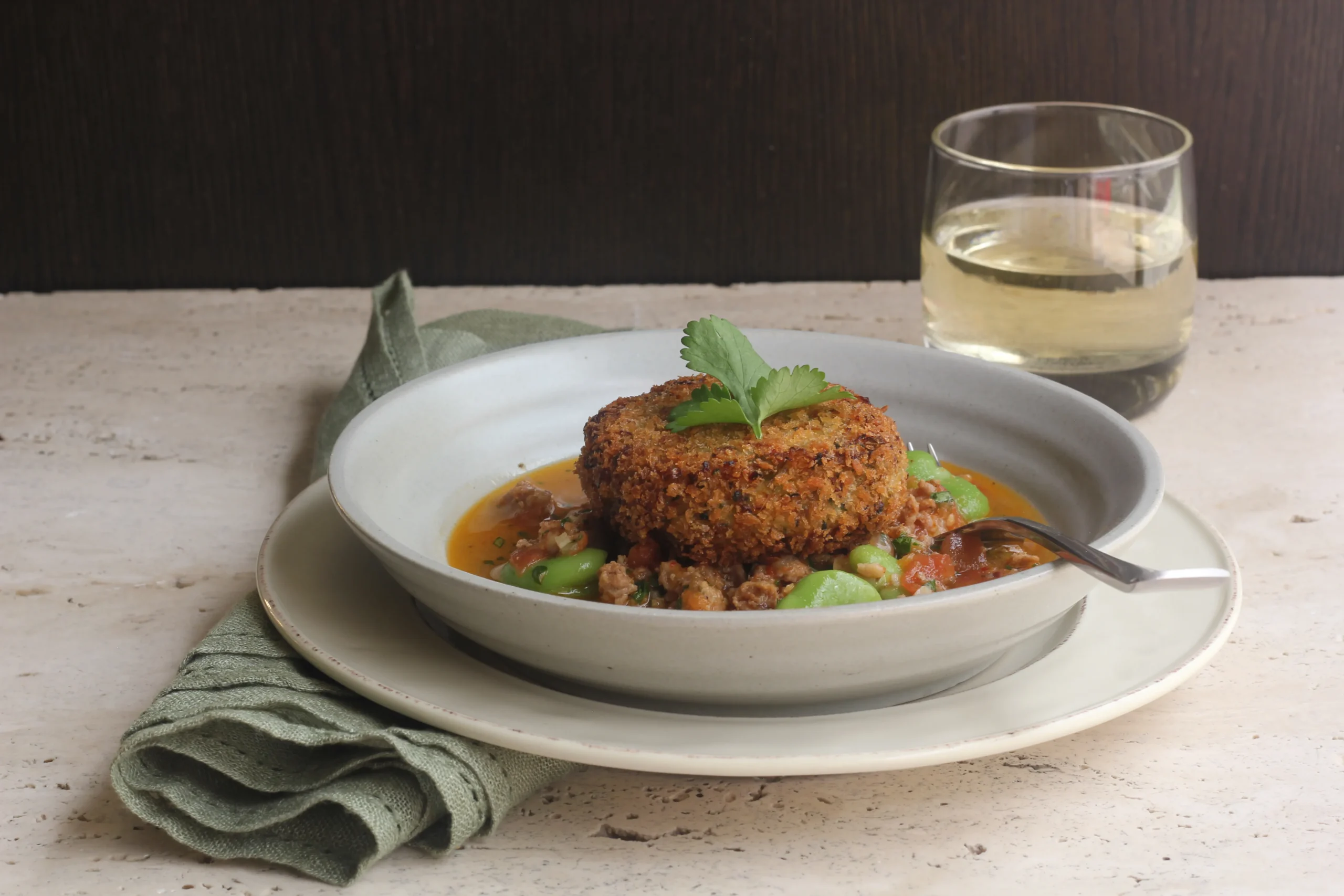 Spicy Salt Cod Cakes with Chorizo and Stewed Fava Beans