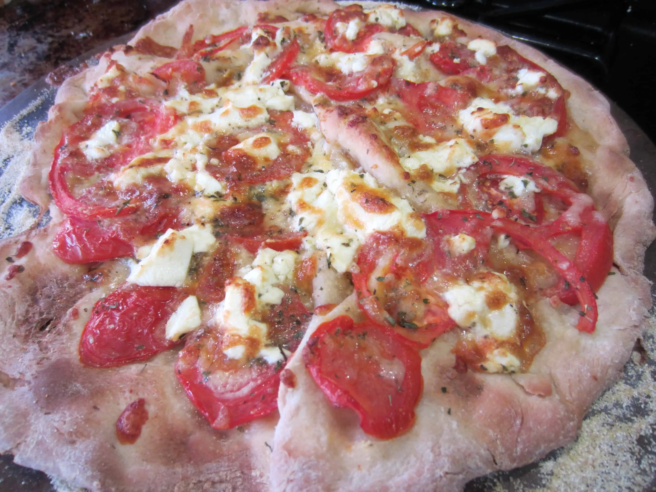 Sun Dried Tomato Veggie and Goat Cheese Pizza