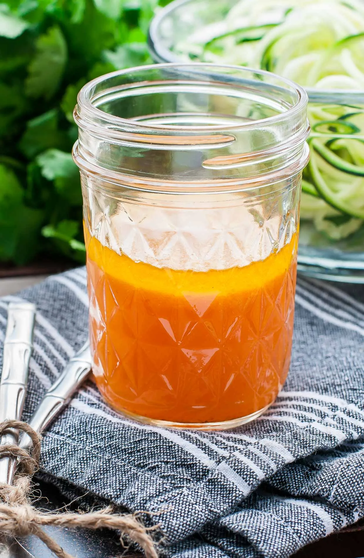 spiralized thai zucchini noodle salad with sriracha dressing